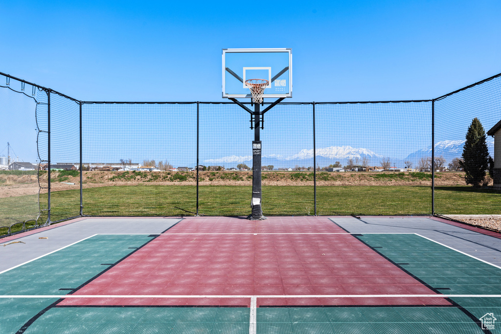 View of basketball court featuring basketball hoop