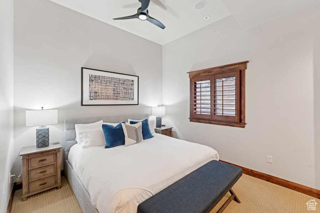 Bedroom with baseboards and ceiling fan