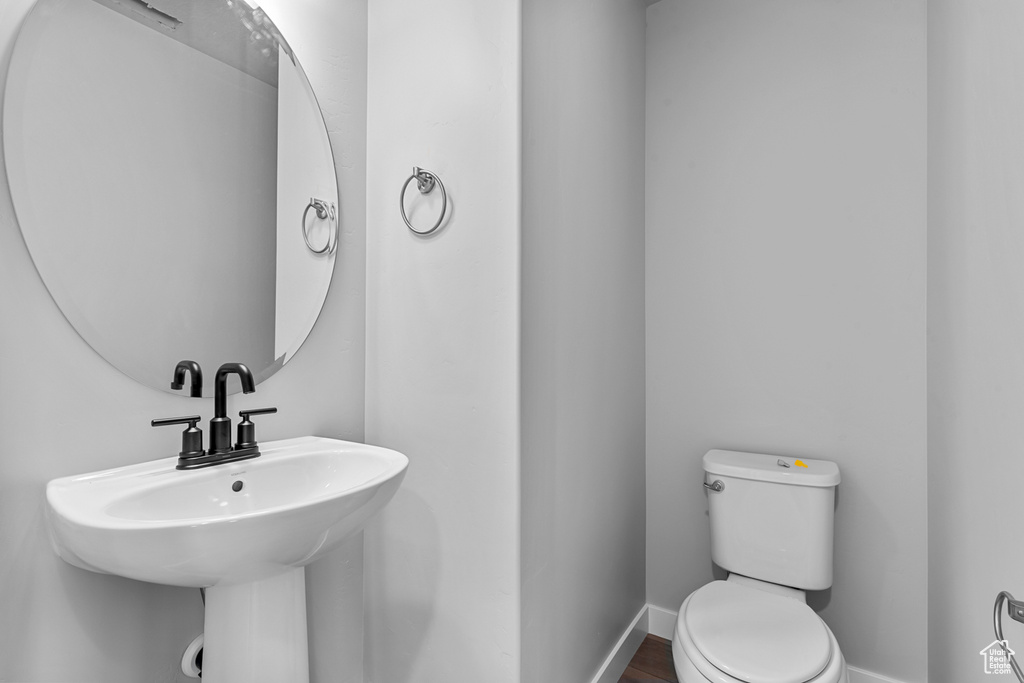 Bathroom with toilet and a sink