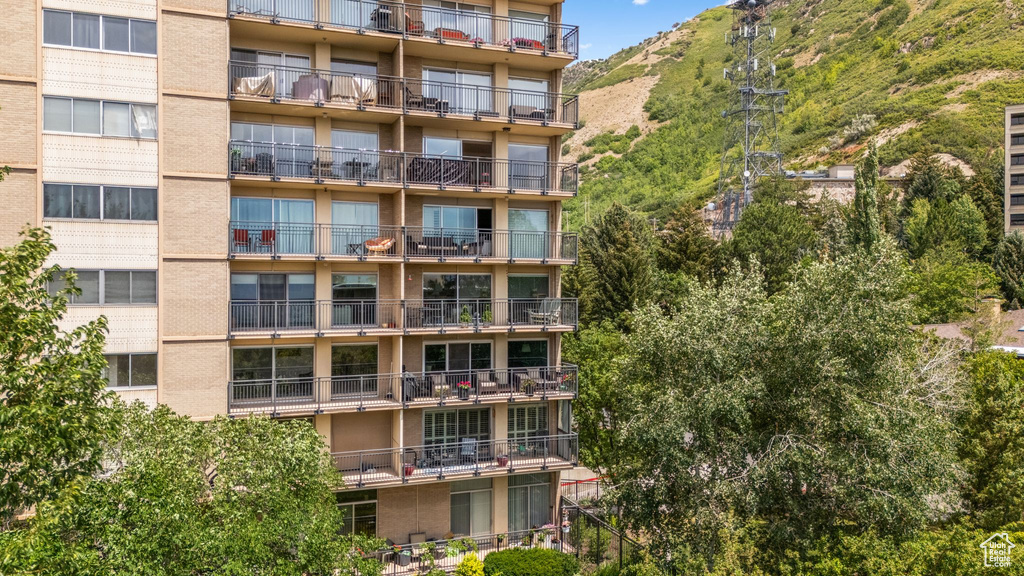 View of apartment building / complex with a mountain view