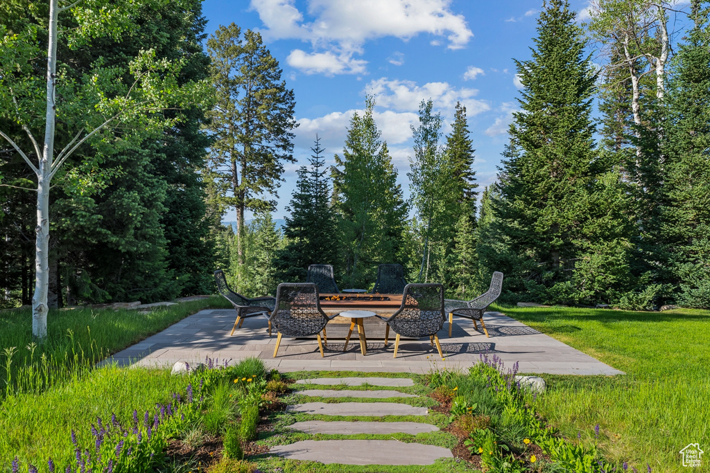 View of yard with a patio area