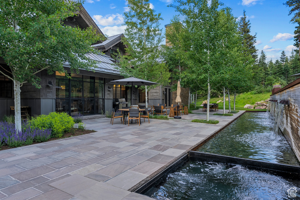 View of patio / terrace with outdoor dining area and grilling area