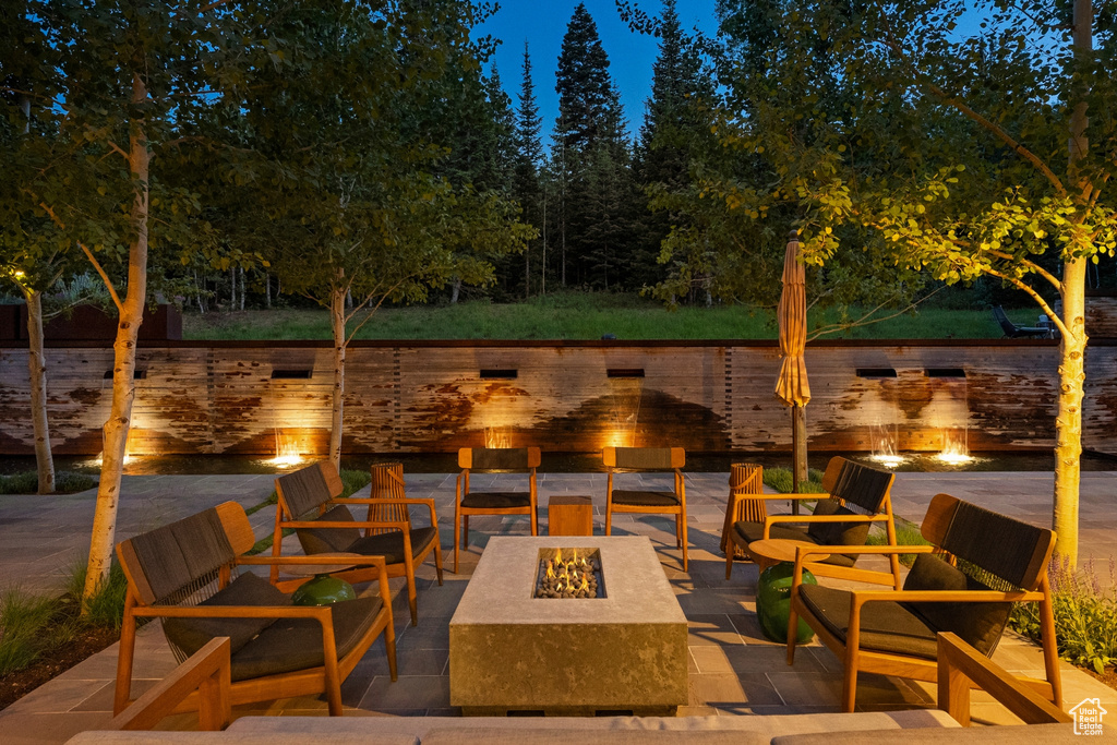 View of patio / terrace with a fire pit