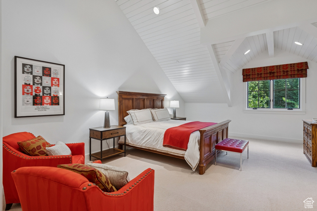 Carpeted bedroom featuring baseboards