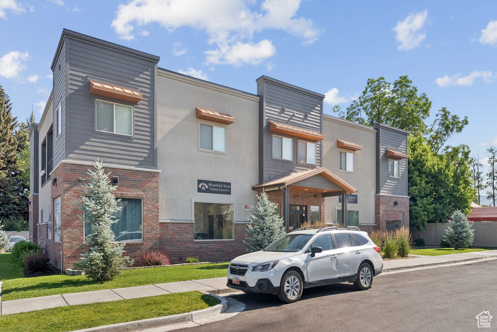 View of front of house featuring brick siding
