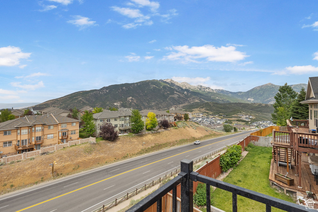 View of mountain background featuring nearby suburban area