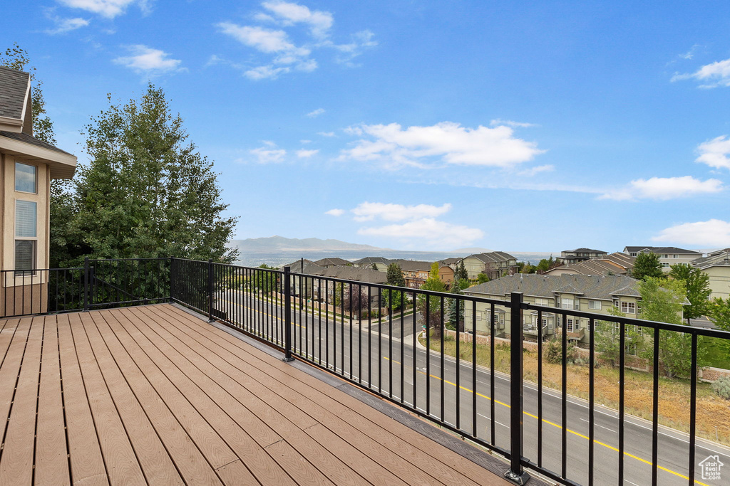 Wooden deck featuring a residential view