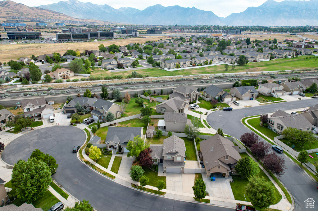 Aerial view of residential area with a mountain backdrop