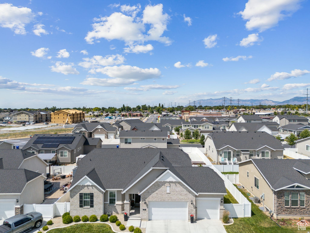 Aerial view of residential area with a mountain backdrop
