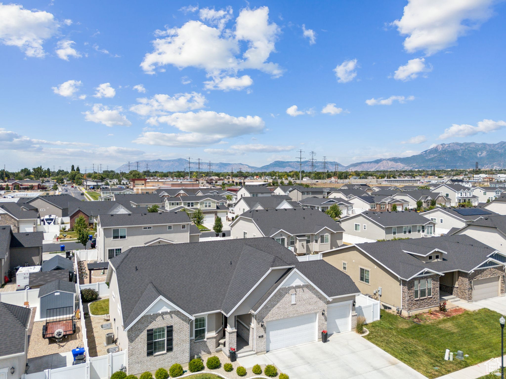 Aerial perspective of suburban area with mountains