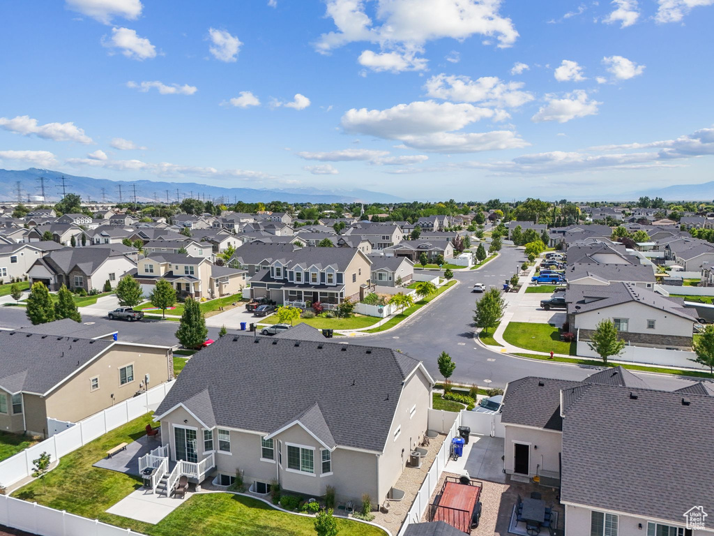 Aerial perspective of suburban area featuring mountains