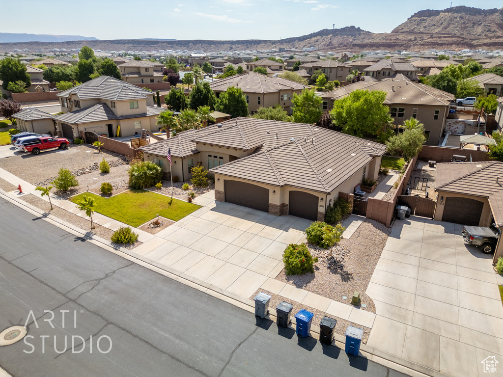 Aerial view of residential area with a mountain backdrop