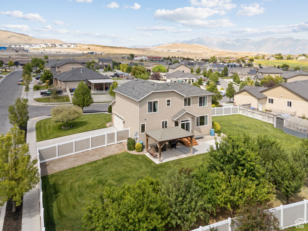 Aerial view of residential area with mountains