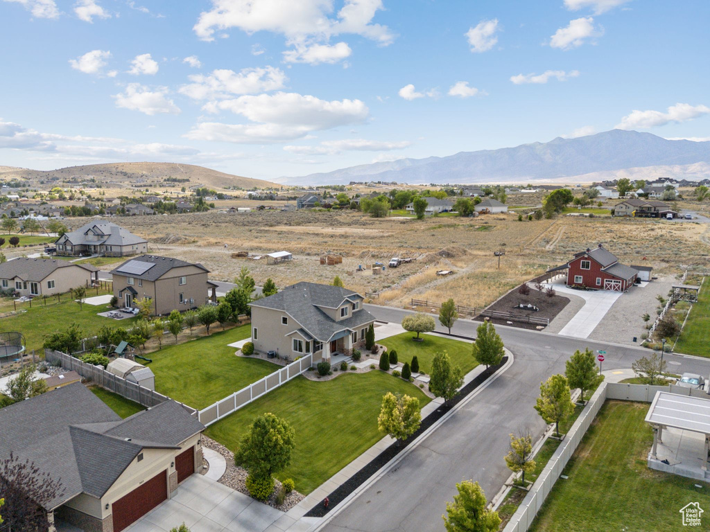 Aerial view of residential area with mountains