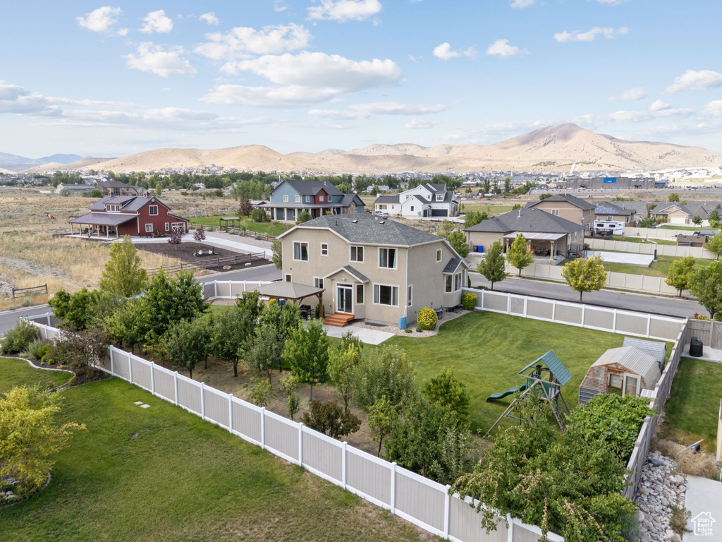 Aerial view of residential area with mountains