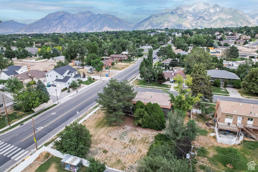 Aerial view of residential area with a mountainous background