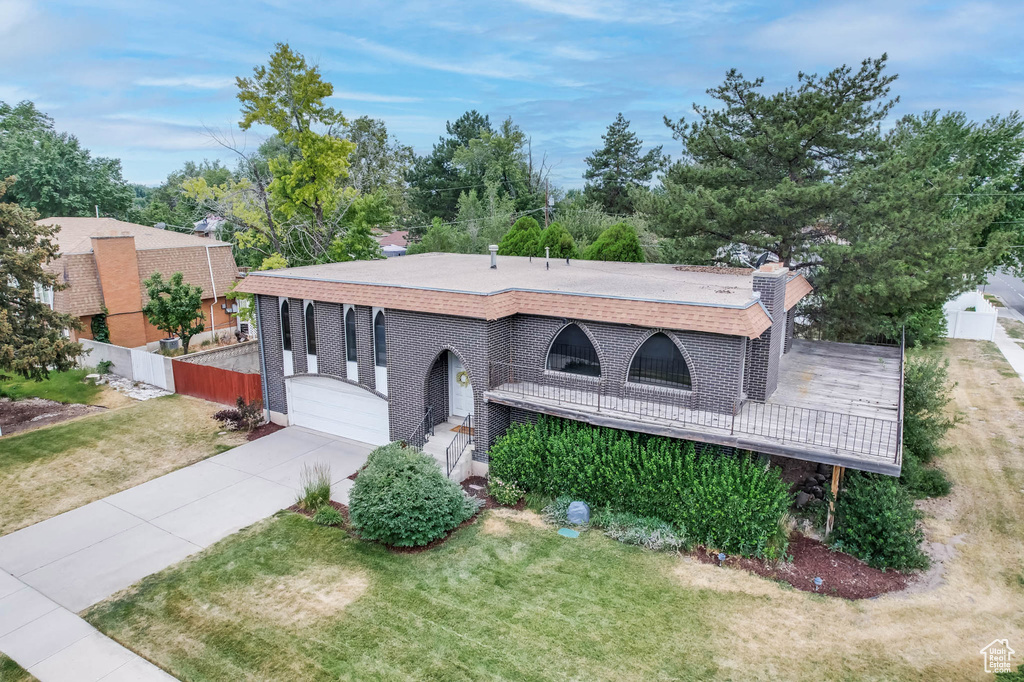 View of front of home featuring concrete driveway