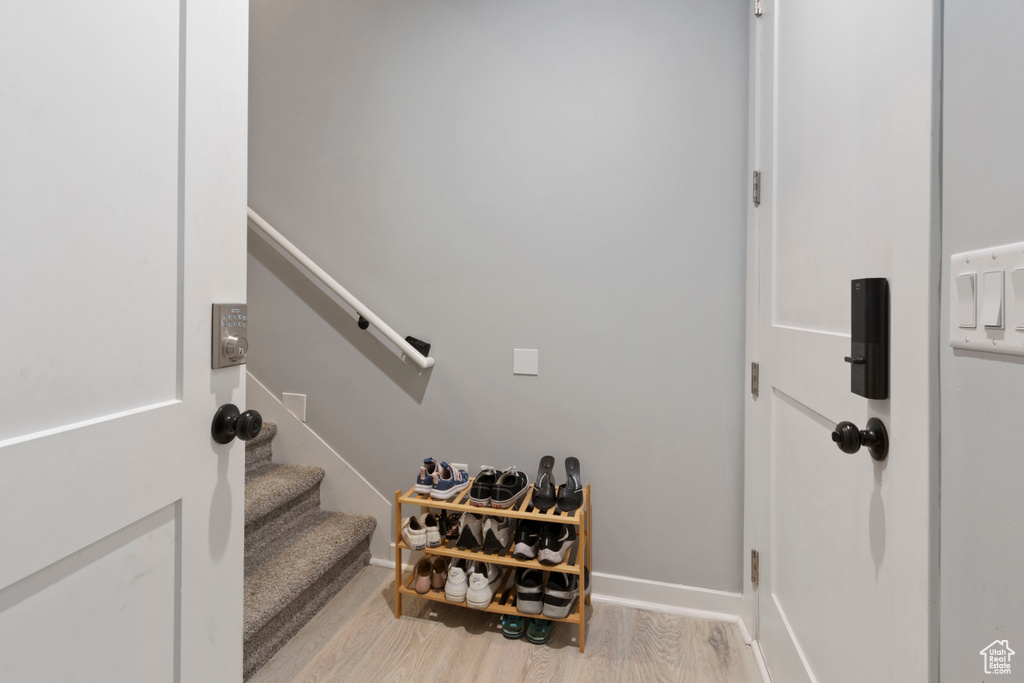 Stairway with wood finished floors