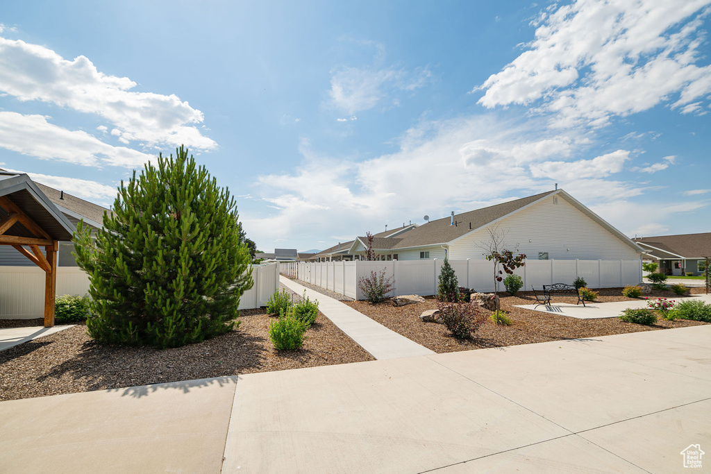 View of side of home featuring a patio