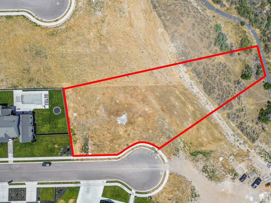 Aerial overview of property's location with property boundaries highlighted