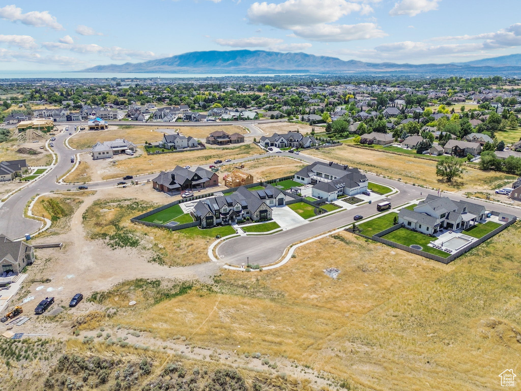 Aerial view of residential area with a mountain backdrop