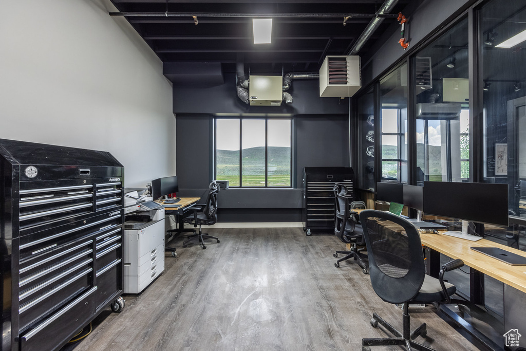 Home office featuring wood finished floors