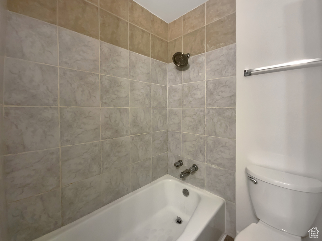 Full bath with toilet and bathing tub / shower combination
