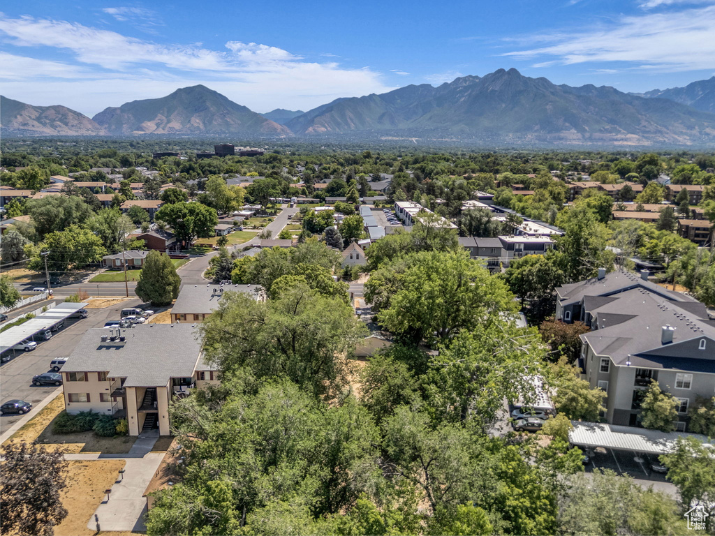 Aerial view of residential area featuring a mountain backdrop