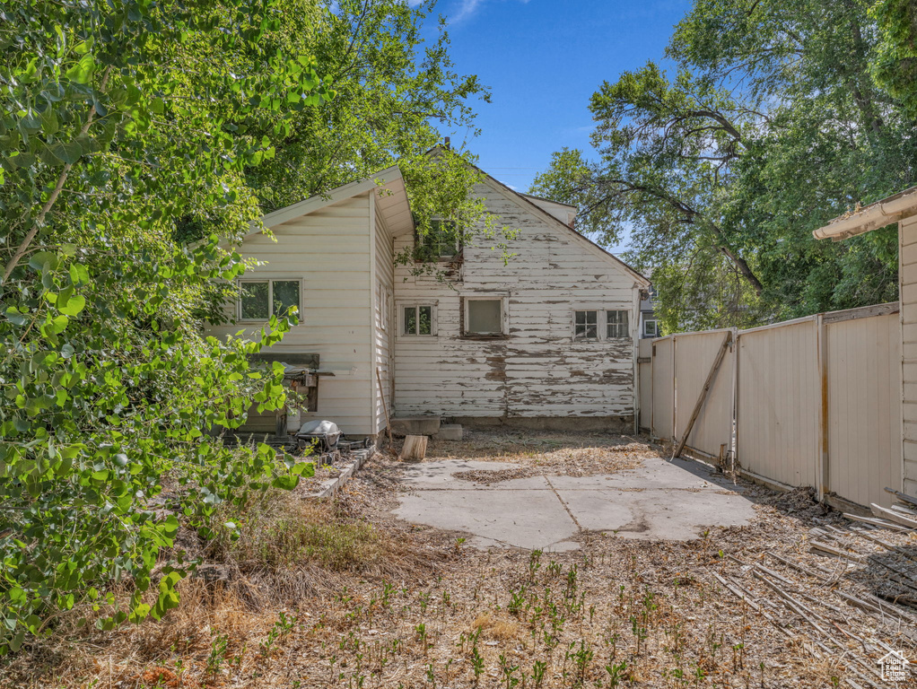 Rear view of house with a patio area