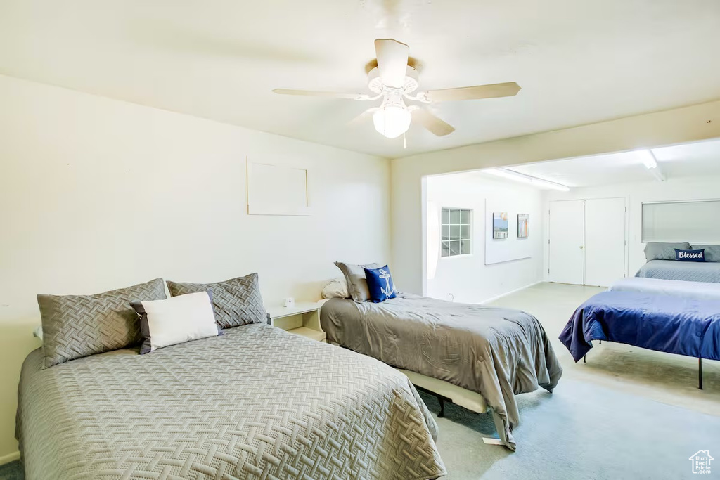 Bedroom featuring carpet floors and ceiling fan