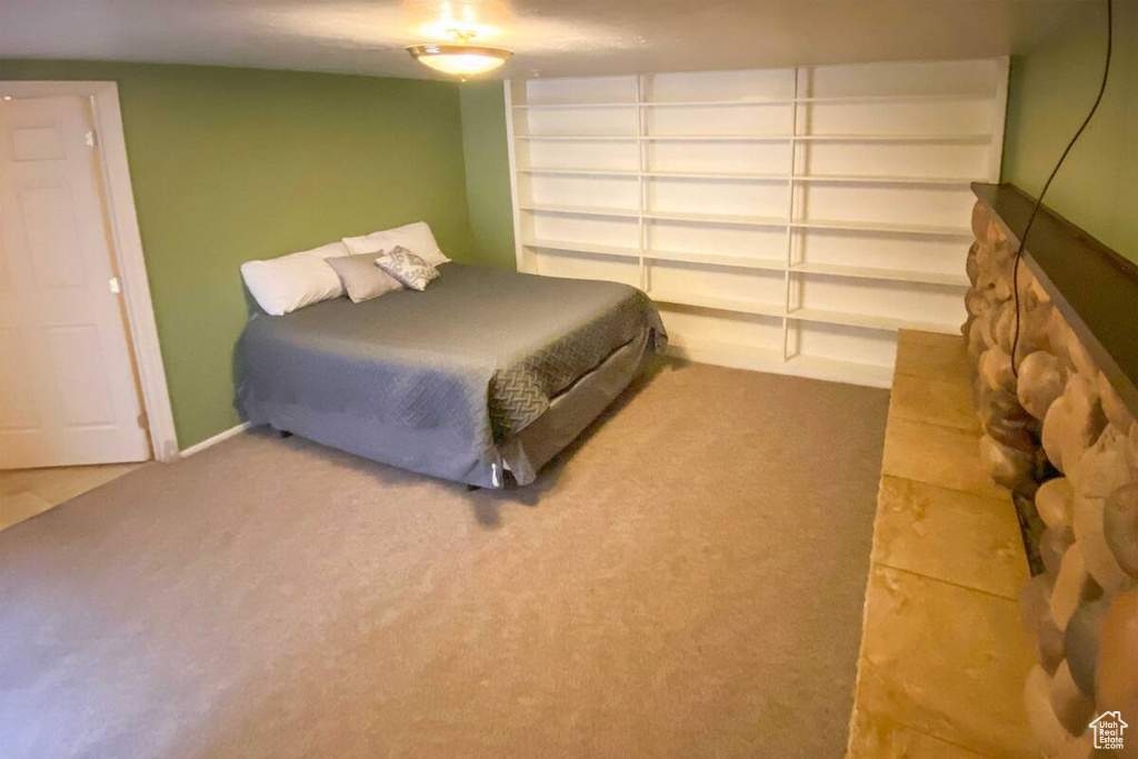 Bedroom featuring carpet