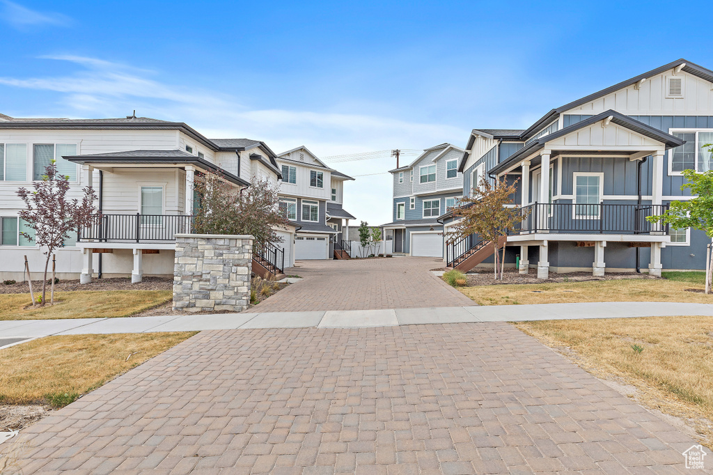 View of road with stairs and a residential view