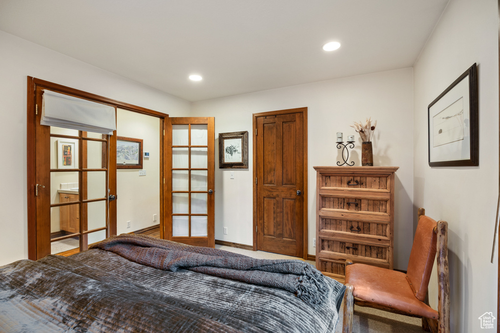 Bedroom featuring french doors and recessed lighting