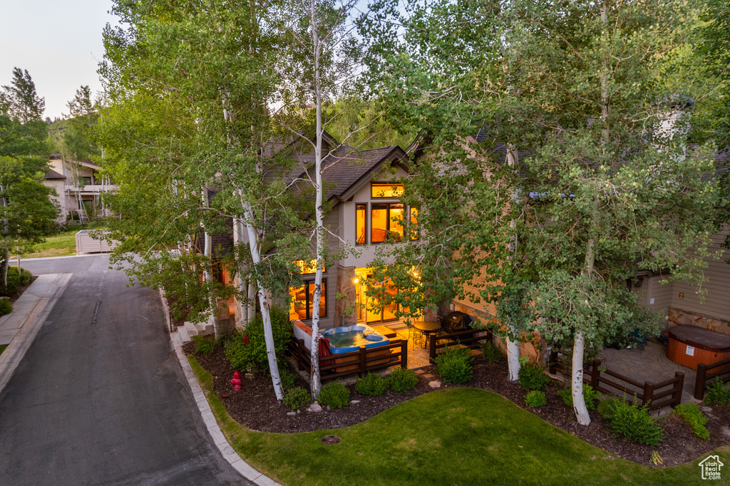 View of front of house with an outdoor hangout area