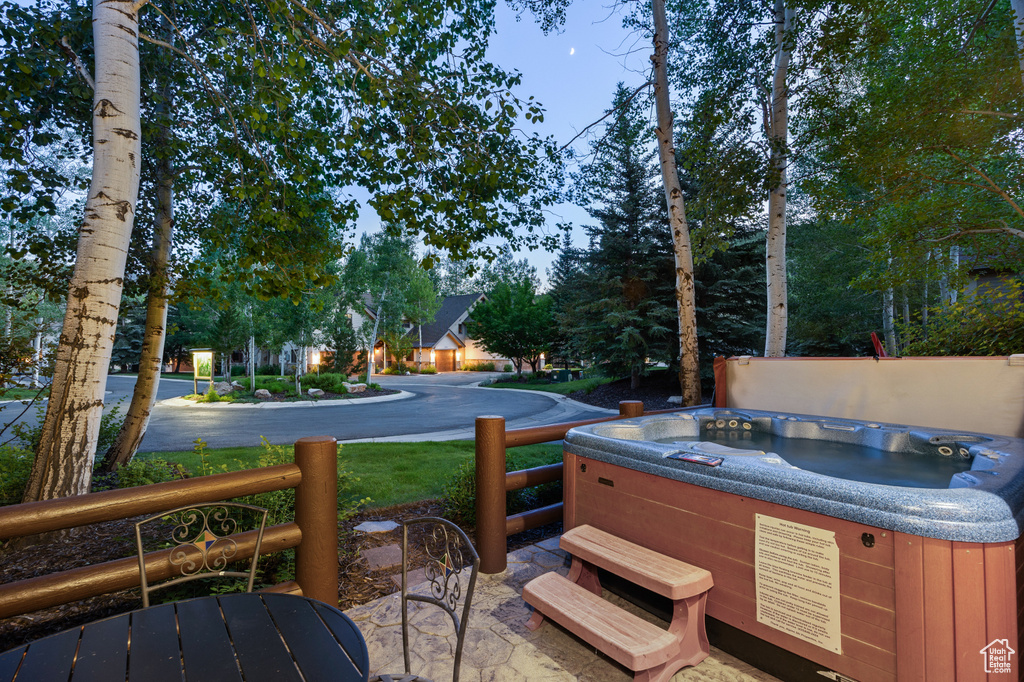 View of patio / terrace with a hot tub