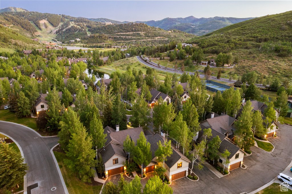 Aerial view of residential area with a mountain backdrop