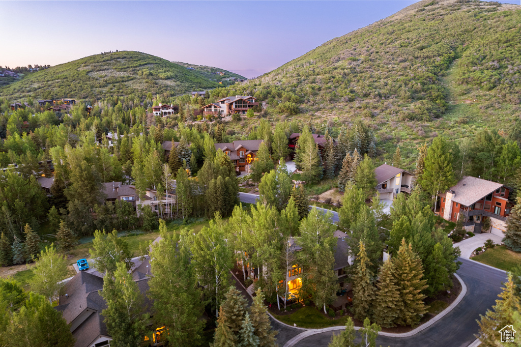 Aerial view at dusk of a mountain view and a residential view