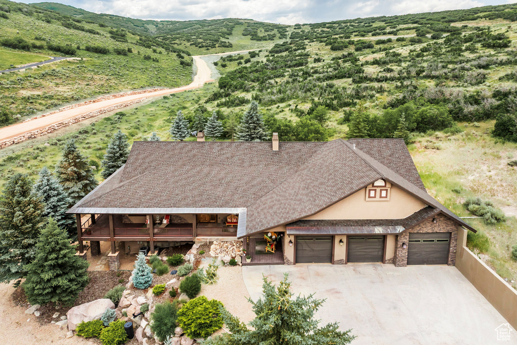 View of subject property with mountains