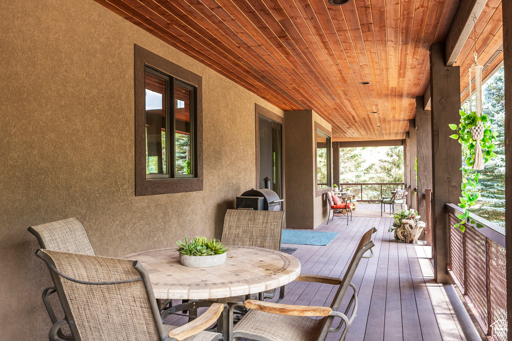 Wooden deck with outdoor dining area