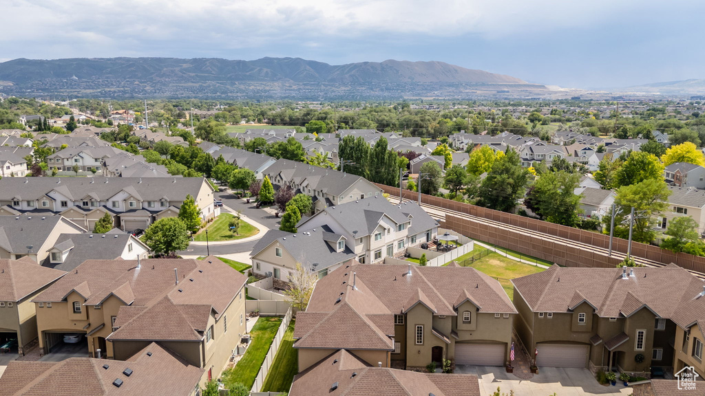Aerial view of residential area with a mountain backdrop