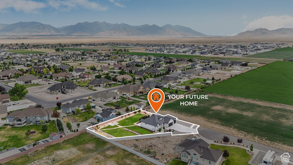 Aerial perspective of suburban area featuring mountains