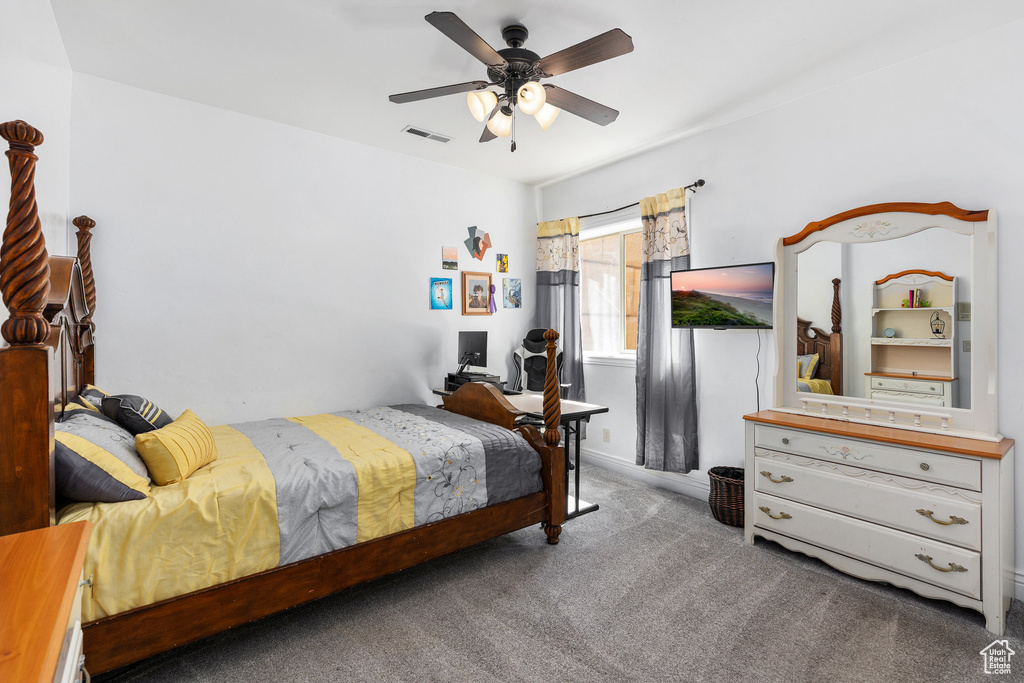 Bedroom with carpet floors and a ceiling fan