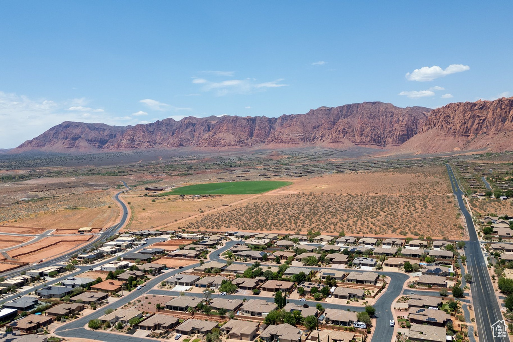 Aerial view of property's location featuring nearby suburban area