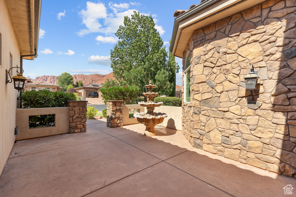 View of patio featuring a mountain view