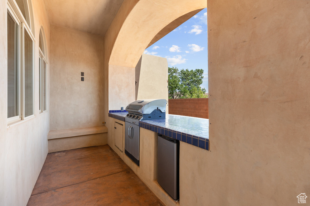 View of patio with exterior kitchen