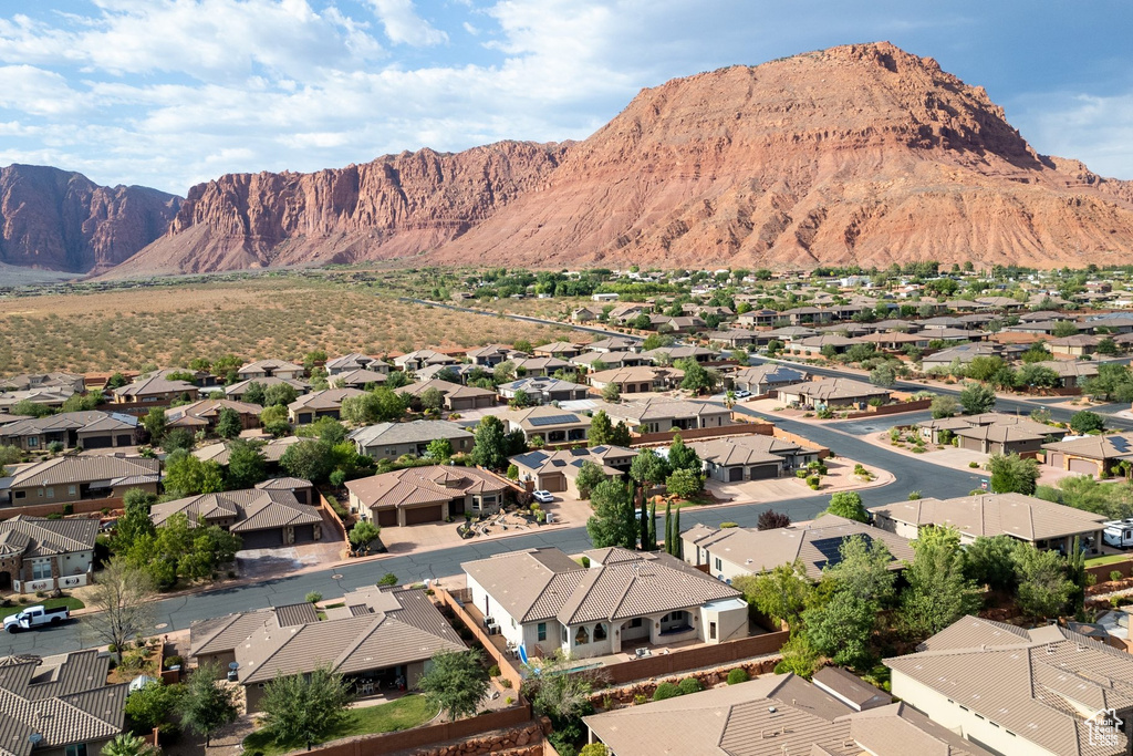 View of mountain backdrop with nearby suburban area