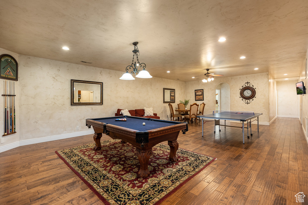 Recreation room featuring recessed lighting, billiards table, wood finished floors, a ceiling fan, and arched walkways