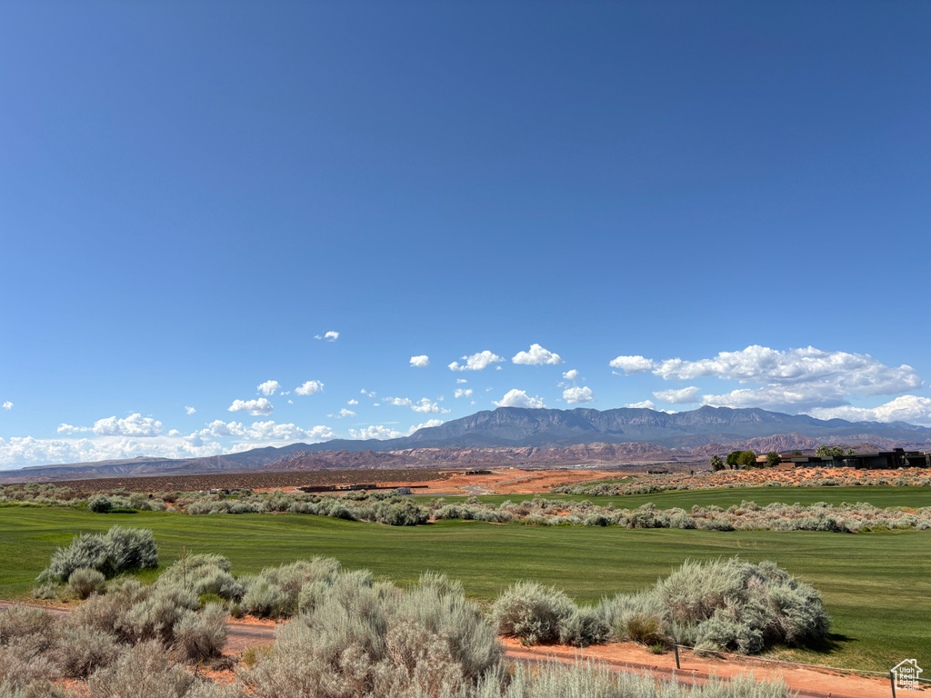 View of mountain backdrop featuring rural landscape