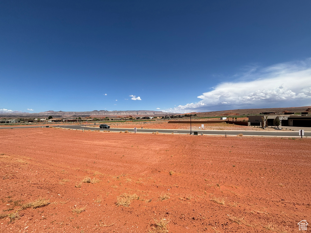 View of yard with a mountain view and a view of countryside