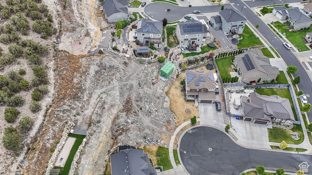 Aerial overview of property's location with nearby suburban area